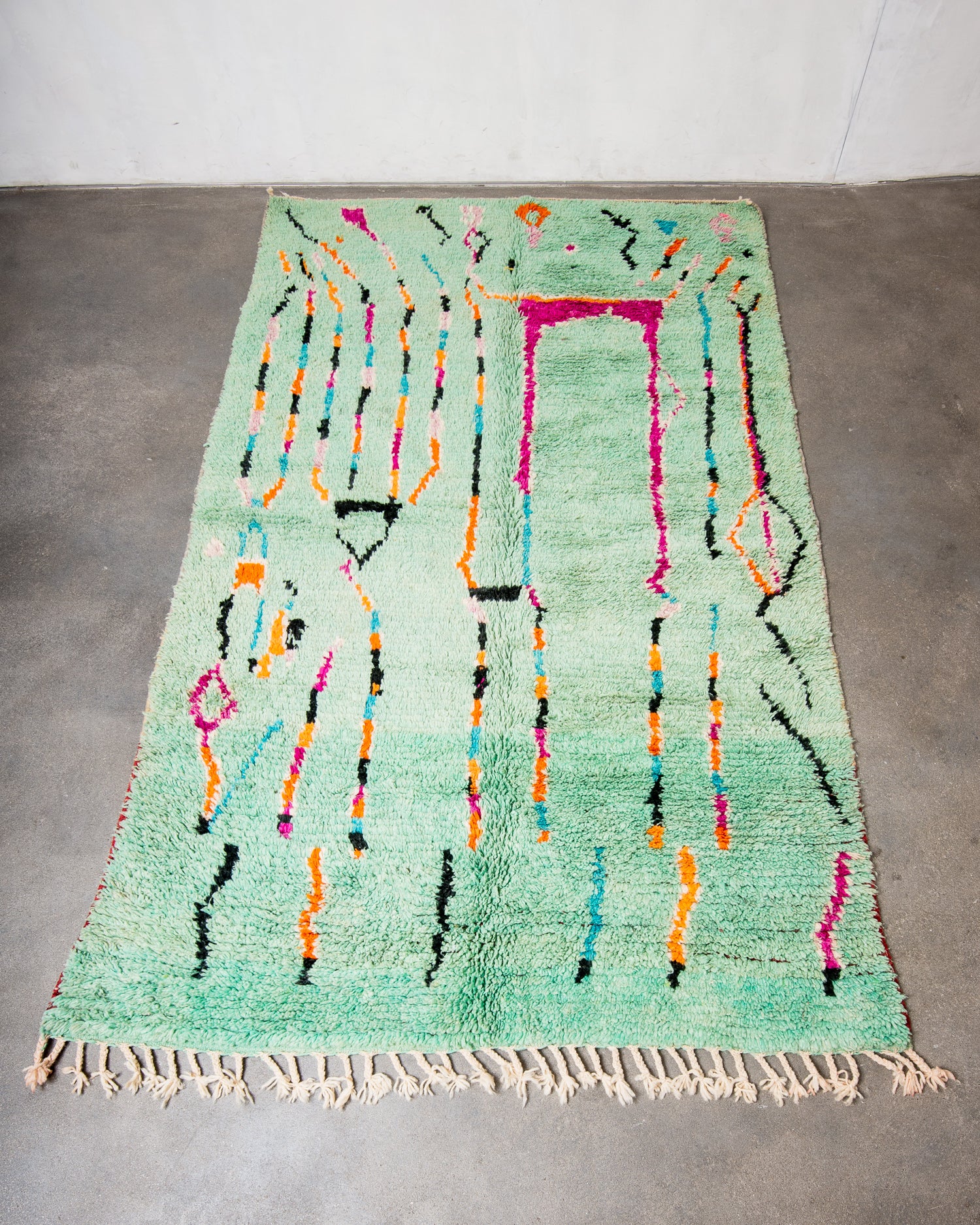 Modern, designer, handcrafted Berber rug from Morocco. Vintage carpet with beautiful colours and patterns and fluffy texture.
